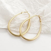 Gold Statement Earrings - image 12