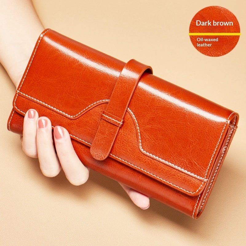 Cartera larga de piel genuina de tres pliegues con broche - image 6