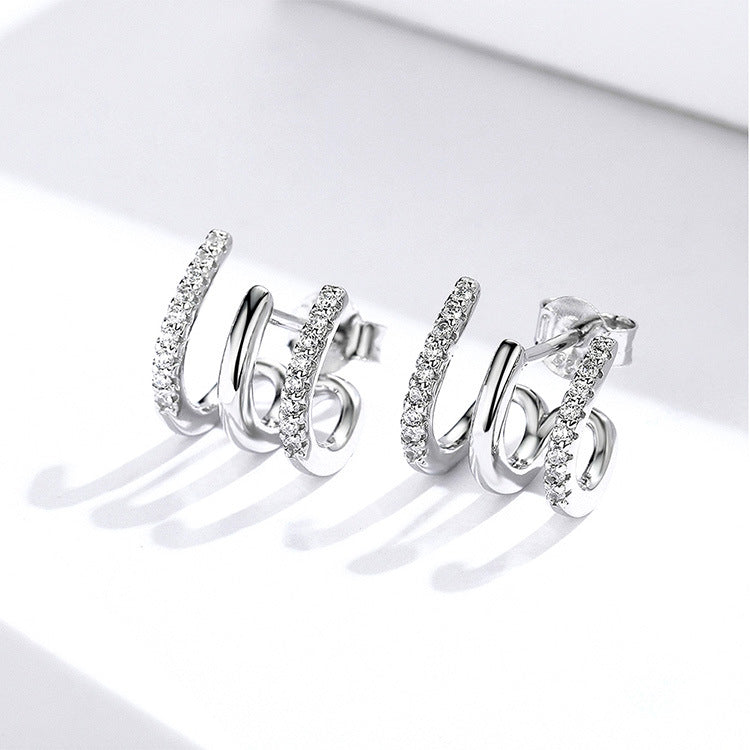 Aretes trepadores de plata de tres capas