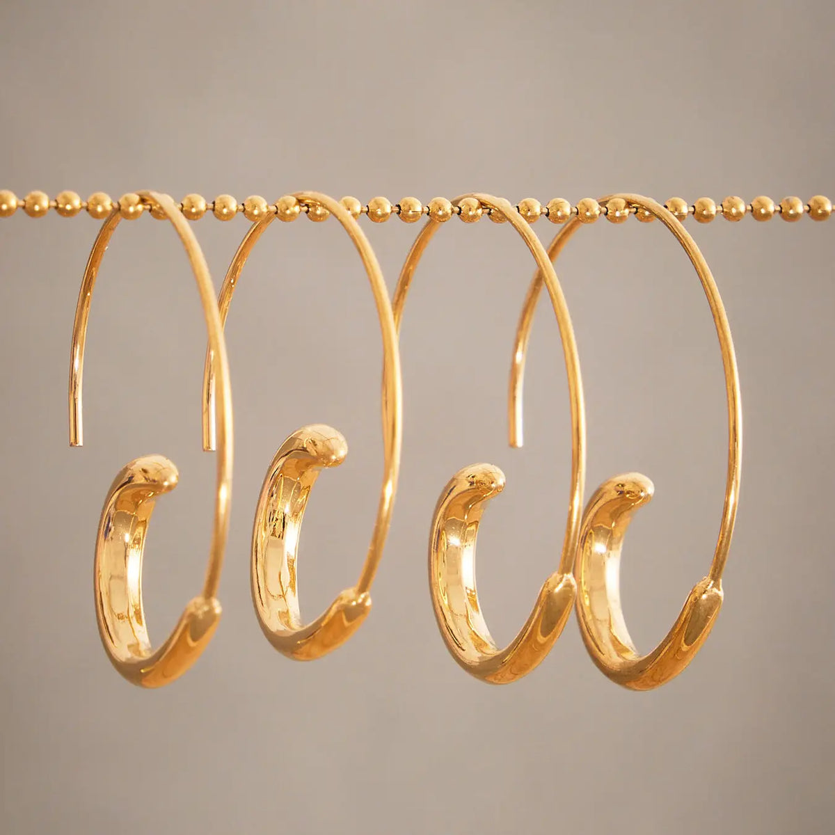 Pendientes de acero inoxidable dorados - image 3