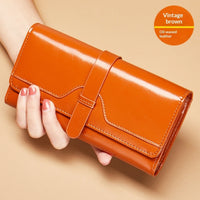 Cartera larga de piel genuina de tres pliegues con broche - image 9