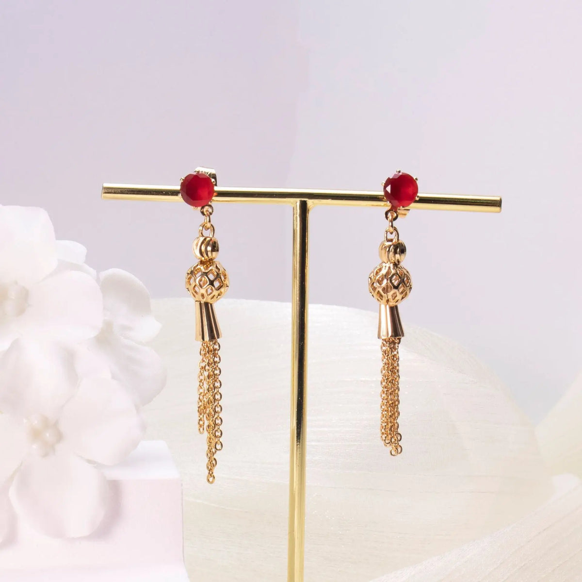 Pendientes de gota con borlas de cristal dorado - image 1