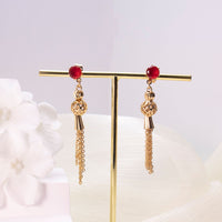 Gold Crystal Tassel Drop Earrings - image 1