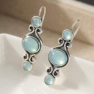 Aretes colgantes vintage con piedras azules