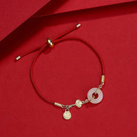 Red Cord Bracelet with Jade Charm - image 1