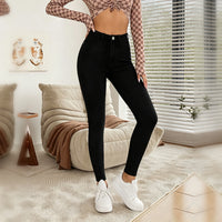 Jeans skinny negros de tiro alto al tobillo - image 1