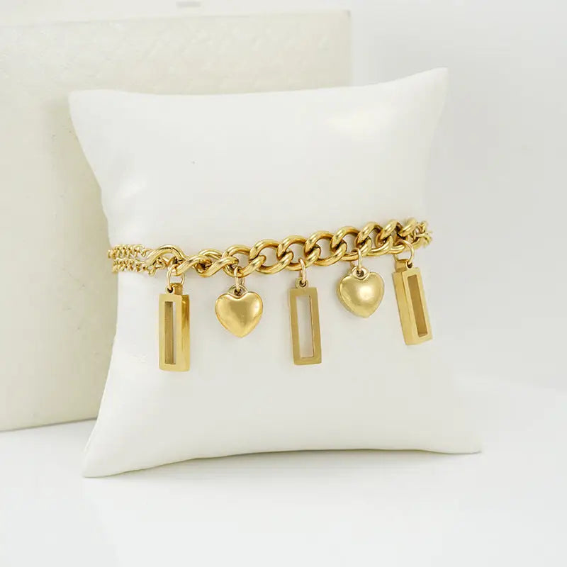 Pulsera de barra con corazón en oro de 18K - image 1