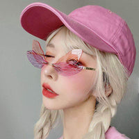 Dragonfly Wing Rimless Sunglasses - image 1