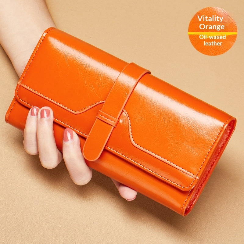 Cartera larga de piel genuina de tres pliegues con broche - image 10