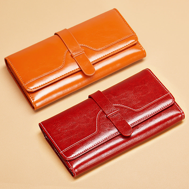 Cartera larga de piel genuina de tres pliegues con broche - image 3