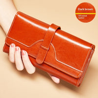 Cartera larga de piel genuina de tres pliegues con broche - image 1
