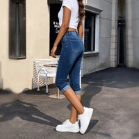 Jeans capri de tiro alto con dobladillo enrollado - image 1