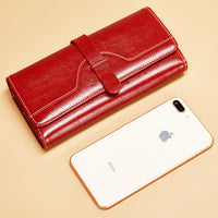 Cartera larga de piel genuina de tres pliegues con broche - image 2