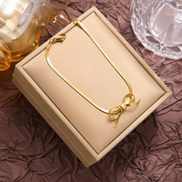 Delicate Bow Necklace and Earring Set - image 1